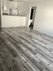 Unit Nº22 - Living Room connects to Bathroom - 3739 Clarington Ave Apartments