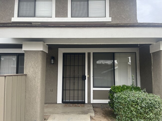 Building Photo - Available Now! 2-Bedroom, 1.5 Bath Condo with Attached Garage Unit B