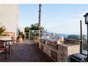 BBQ area. Pool below condo - 640 The Vlg Unit 312