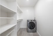 Studio - 400SF - Laundry Room - Hawthorne Chateau