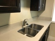 Kitchen - new counter tops and sink - 325 S Doheny Dr Apartments
