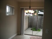 Dining Area w/ Patio - 2215 Clark Ln Apartments Unit A
