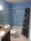 Granite vanity and Bath - 65 10th St Apartments Unit 3