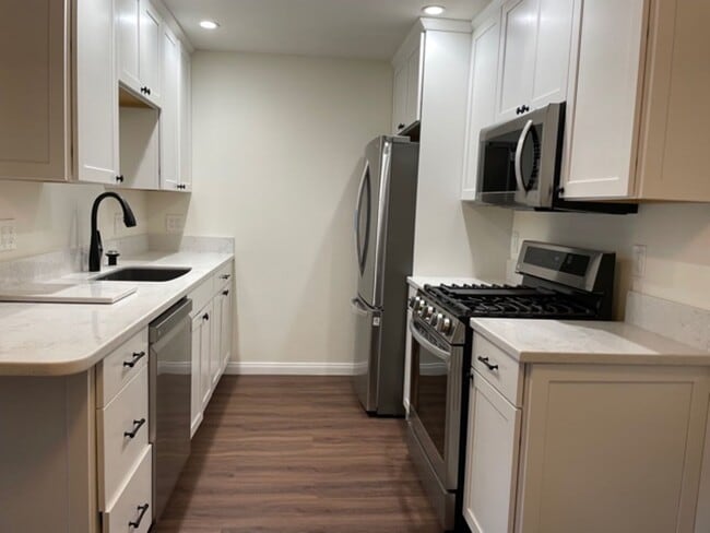 Photo - 6600 Warner Ave Unit Warner #216