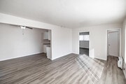 2BR, 1BA - 869SF - Living Room - Courtyard Apartments