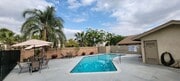 Swimming pool and sun deck at Las Casitas Apartments in Riverside, California. - Las Casitas Apartments