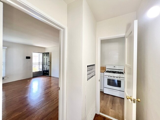 Photo - Charming 2-Bedroom Home with Hardwood Floors & Fireplace Near the Traffic Circle Unit 4510 E 15th St