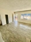 Living room - 1018 E 32nd St Apartments Unit D