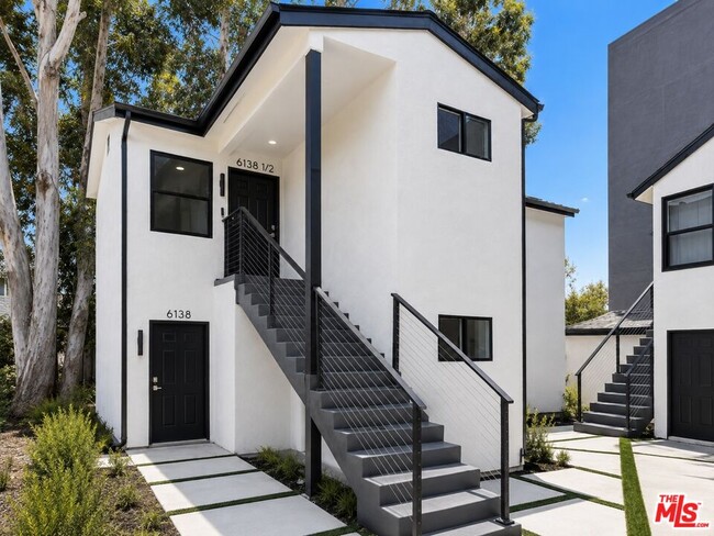 Building Photo - 6138 Carlos Ave Unit 1/2