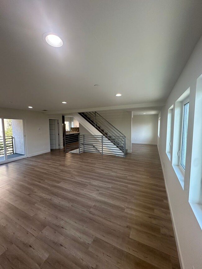 Photo - Spacious & Modern Tri-Level Townhome | 3 Bed, 2.5 Bath with Private Balcony