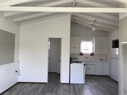 Nice open kitchen area - 6675 Sunset Rd Apartment Unit Cottage