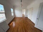 Photo - 212 1/2 W 57th St Unit 212 upper