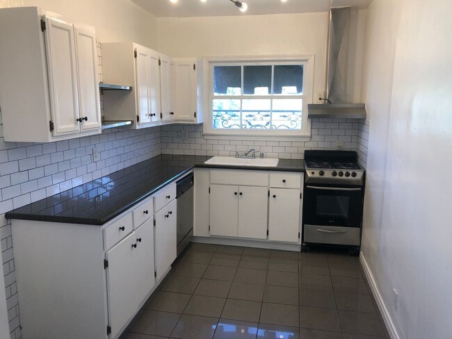 Building Photo - ******* BEAUTIFUL FRENCH NORMANDY STYLE 2B... Unit 29-201