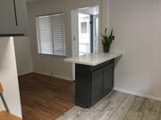 kitchen island 2x4 ft with view to front door - 4118 Mercury Ave Unit A