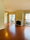 Living Room with Fireplace and 2 Balconies! - 2908 W. Victory Apartments