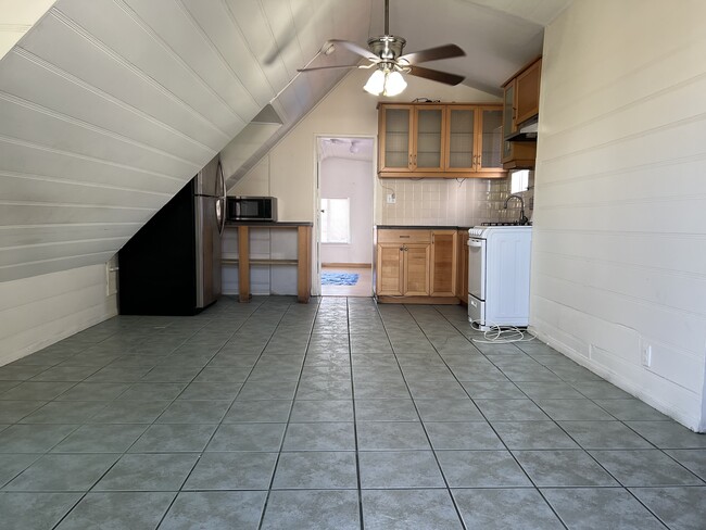 Entryway/Living Room & Kitchen - 3976 W 7th St Apartments Unit .5