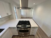 Photo - Located on a large lot, along with only four other cottage units, sits this 2 bedroom 1 bath unit