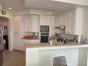 Photo - 5142 Warner Ave Unit 205
