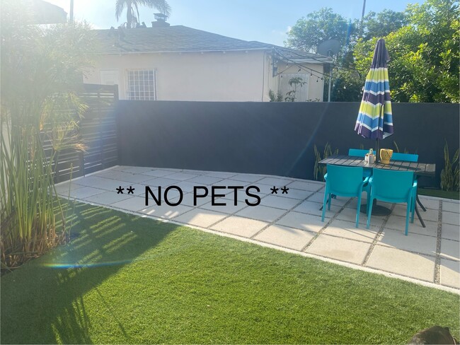Quiet, shared yard. - 3711 Veteran Ave Apartments Unit Palms Studio Duplex