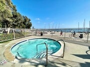 Photo - Live in Luxury Right on the Bay! Assigned Parking! Peek A Boo Bay View!