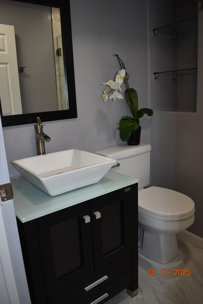 Downstairs Bathroom with Walk in Shower - 716 Flower Ave