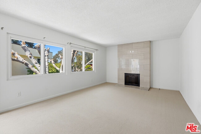 Building Photo - 8401 Tuscany Ave Unit 4