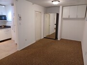 Living area with large mirrored closet - 7649 Beckett St House