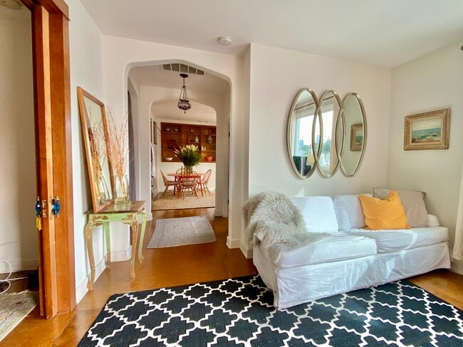 living room looking through hallway into kitchen - 1619 1/2 Grafton St