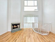 dining room with 3-story height ceilings - 14 Reef St Townhome