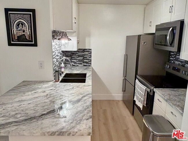 Photo - 7777 W 91st St Unit A