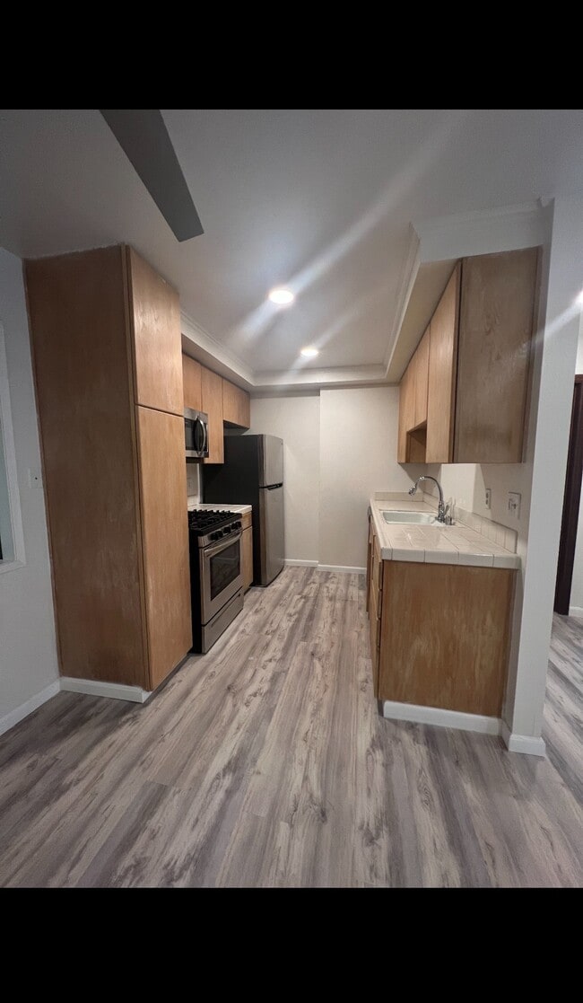 Photo - 6600 Warner Ave Townhome