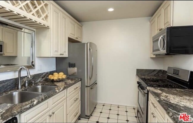 Photo - 6600 Warner Ave Unit 84