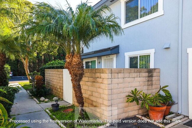 Building Photo - Welcome to this charming two-story home located in the vibrant Huntington Beach Unit CI135