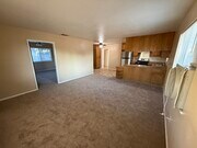 Living room and kitchen - 15936 Lime St House
