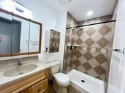 Photo - Stunning 4BR Townhome with Hardwood Floors, Private Patio, Community Pool & 2-Car Garage!