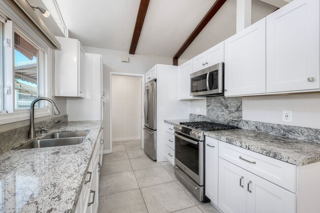Photo - San Diego- Near Del Cerro - Refreshed 4 bed / 2 bath Home w/Solar ,A/C, Large Yard, Garage, and M...
