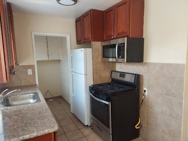 Photo - 11837 S New Hampshire Ave Unit 11839