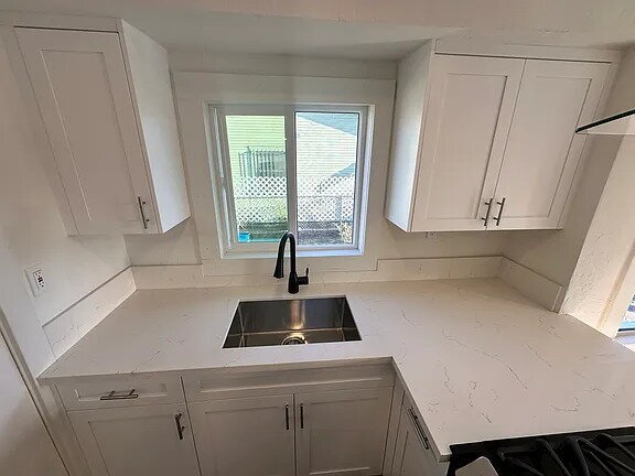 Photo - Located on a large lot, along with only four other cottage units, sits this 2 bedroom 1 bath unit