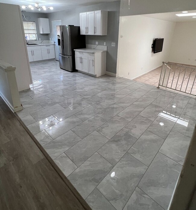 Photo - 5 bed 3 bath w/ large rooms and backyard