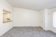 1BR, 1BA - 750SF - Living Room - Nutwood Park Apartments