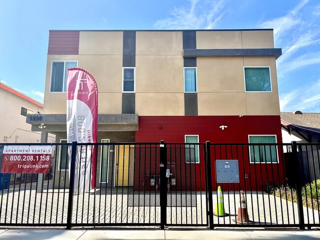 Photo - 1236 W 37th St Apartments