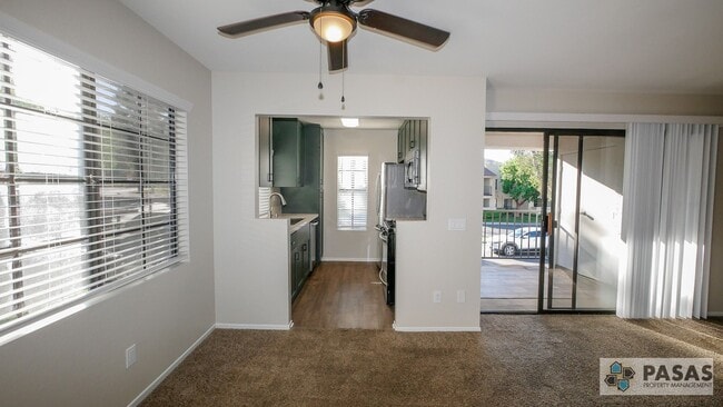 Building Photo - Bright Upgraded Condo w/ Quartz Kitchen, Covered Parking, Pool & Spa Unit 202