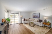 1BR, 1BA - 700SF - Living Room - Creekside Meadows