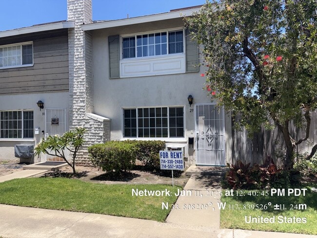 Building Photo - Two bed 1.5 bath townhome available now.