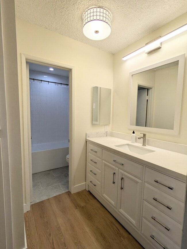 Bathroom vanity (view from hallway) - 11959 Nebraska Ave Unit 101