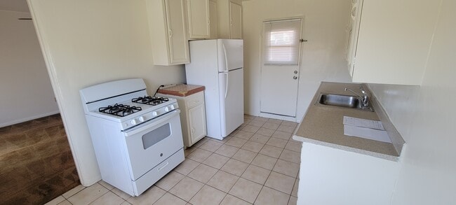 Building Photo - 920 W Washington Ave Unit # 2