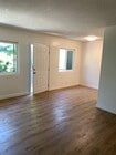 LIVING ROOM - 1242 N Westmoreland Ave Apartments