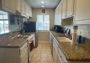Photo - Updated 2nd Floor Corner Condo Unit -3425 E. 15t... Unit 17-D