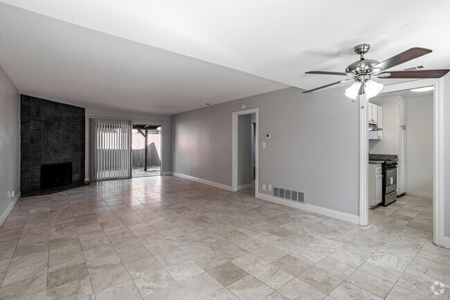 2BR, 2BA - 950SF - Living Room - Chaumont Villas Apartments