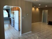 Kitchen entrance from living room. - 14911 Fonthill Ave